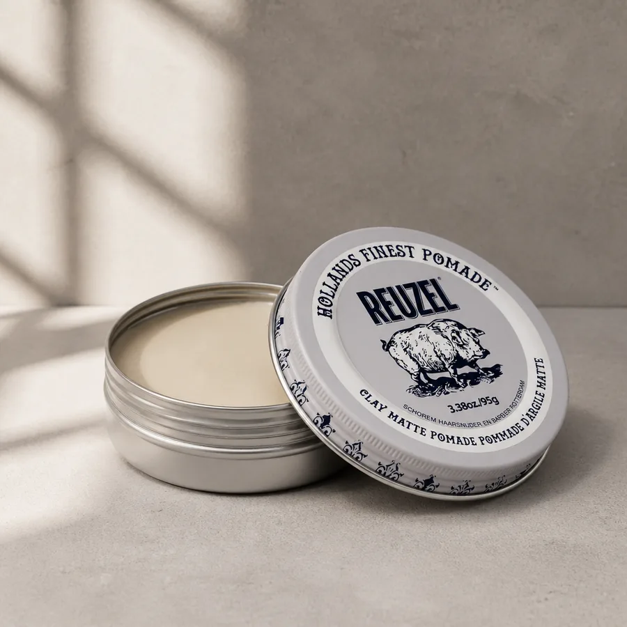 Men's styling products — matte clay and shine pomade